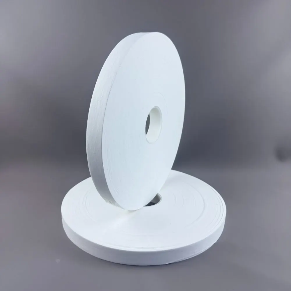 Heat-sealable nonwoven rolls for nicotine caffeine and functional pouches