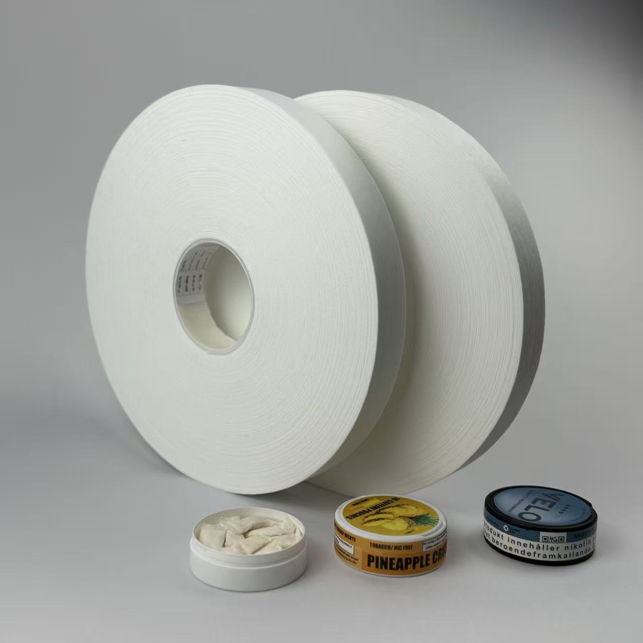 Pouch nonwoven rolls and oral pouch applications for grade comparison