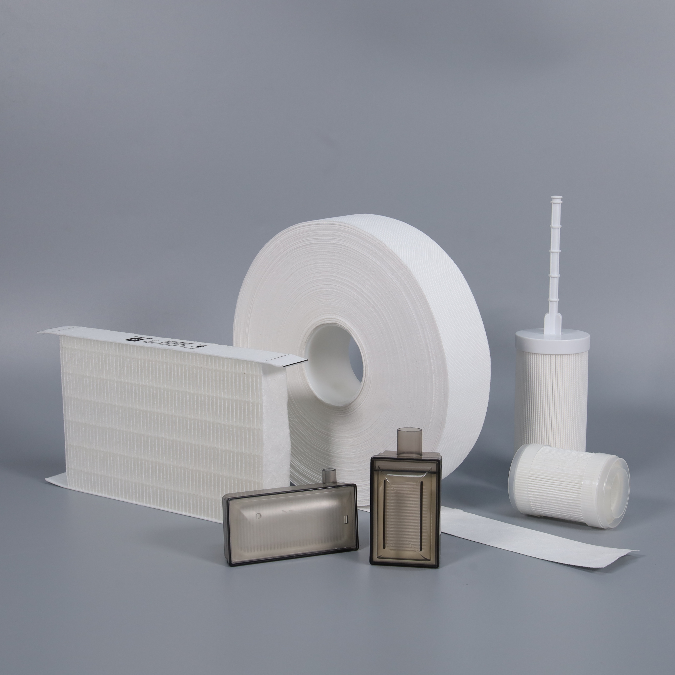 Nonwoven filter media rolls and filter components for water and air filtration