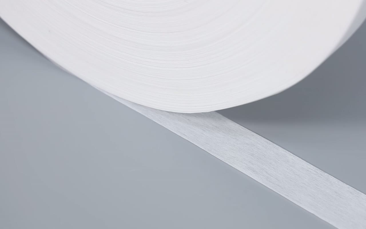 Close-up roll of pouch-grade nonwoven material for sample evaluation