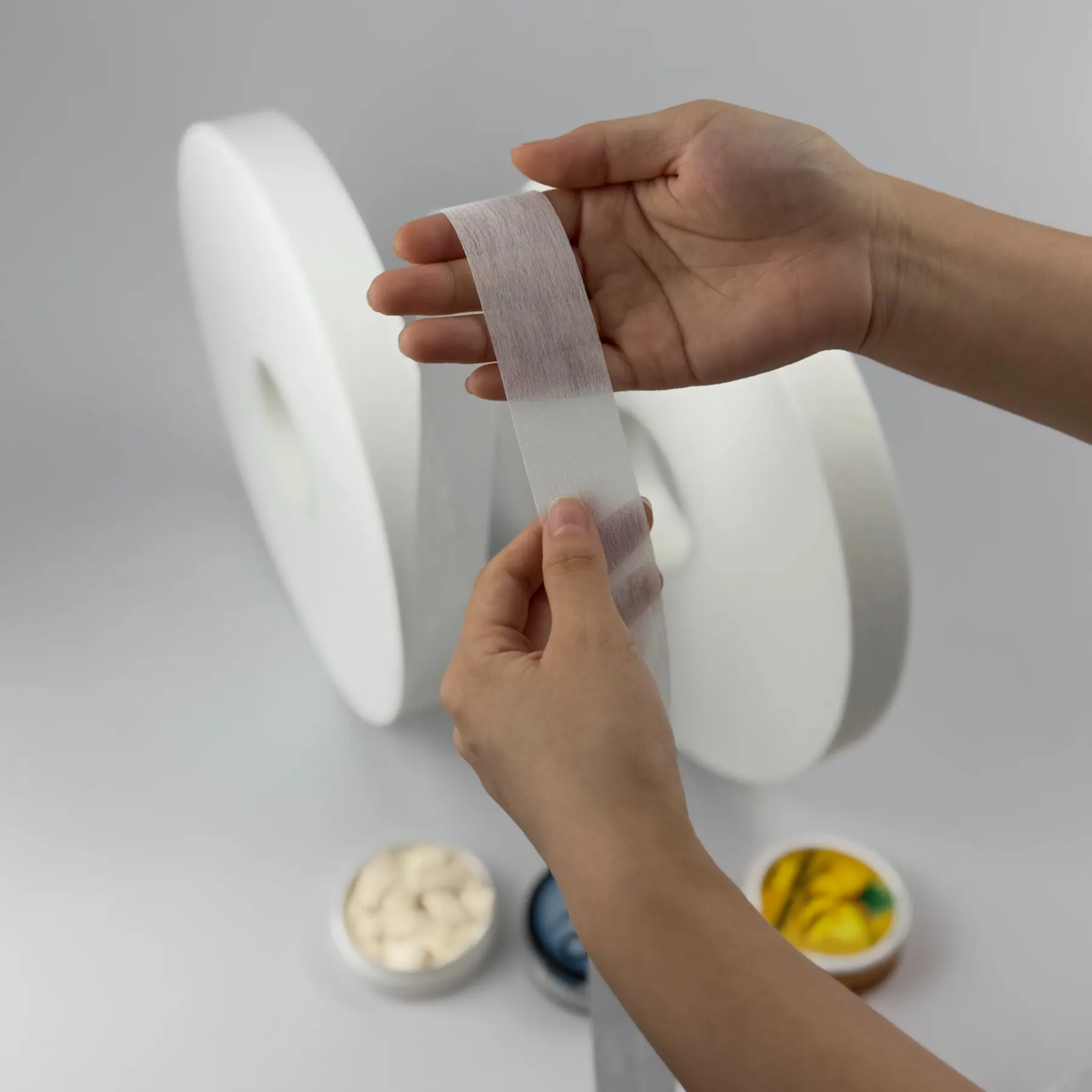 Custom oral pouch material with heat sealing and sample testing support